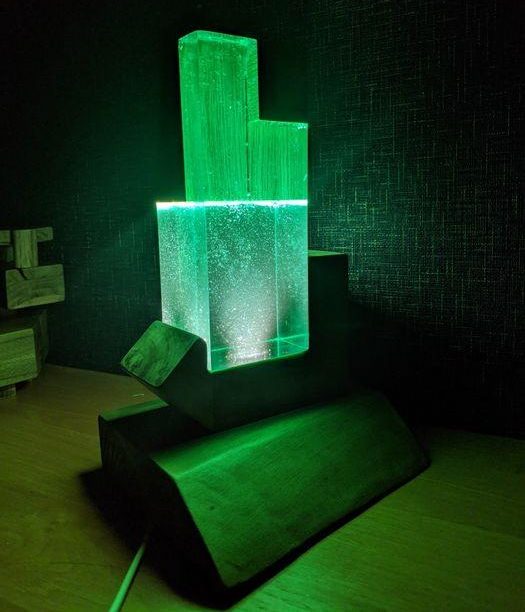 Interesting lamps made of wood and epoxy resin